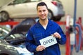 Car mechanic in auto repair shop Royalty Free Stock Photo