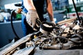 Car mechanic change engine oil. Car repair. Service station