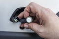 Car mechanic changes the parking sensor on the car, the sensor malfunction of parking sensors Royalty Free Stock Photo