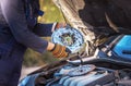 Car mechanic is changing clutch Royalty Free Stock Photo