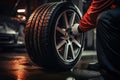 Car mechanic changing tire. Generative AI