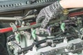 Car mechanic Checking fuel injector system, Car maintenance service