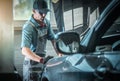 Car Mechanic Fixing Vehicle Royalty Free Stock Photo