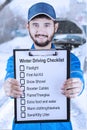 Car mechanic giving winter driving tips Royalty Free Stock Photo