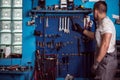 Car mechanic and his tools Royalty Free Stock Photo