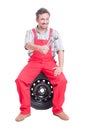 Car mechanic holding keys or wrenches Royalty Free Stock Photo