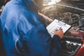 Car mechanic inspecting vehicle. Auto inspection concept Royalty Free Stock Photo