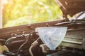 Car mechanic replacing fresh oil into engine at maintenance repair service station.selective focus. Royalty Free Stock Photo