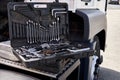 Car mechanic tool set in auto repair shop