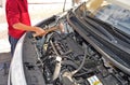 A Car Mechanic Using A Hammer - Motor Technition Engine Motor Royalty Free Stock Photo