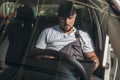 Car mechanic working in auto repair service using laptop Royalty Free Stock Photo