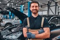 Car mechanic working at automotive service center Royalty Free Stock Photo