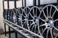 Car metal wheels on shelves in repairing auto service. Generate ai