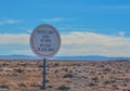 Car and Meteor speed limit sign. On the road to the Meteor Crater Natural Monument on the Arizona Rocky Plain Royalty Free Stock Photo