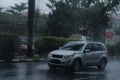 a car in the midddle of rain Royalty Free Stock Photo