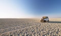 Car in the middle of salt lake near Kubu island Royalty Free Stock Photo