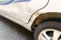 Car with minor dent and scratch due to accident Royalty Free Stock Photo