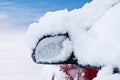 Car Mirror Covered With Snow