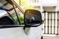 Car mirror side rear view white color modern car Royalty Free Stock Photo