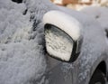 Car mirror under the snow Royalty Free Stock Photo