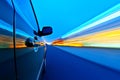 Car with motion blur background. Royalty Free Stock Photo