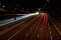 Car motion trails. Speed light streaks the background with blurred fast moving light effect Royalty Free Stock Photo