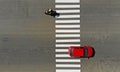 Car and motorcycle crossing a pedestrian crosswalk zebra on a highway