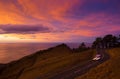 Car on mountain road at sunset, Mount Jaizkibel