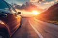 car on mountain road traveling around the world highways and sunset, tires on the asphalt road Royalty Free Stock Photo