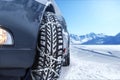 Car with mounted snow chains