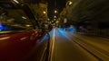 Car moves at fast speed at the night streets timelapse hyperlapse drivelapse. Royalty Free Stock Photo