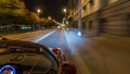 Car moves at fast speed at the night streets timelapse hyperlapse drivelapse. Royalty Free Stock Photo