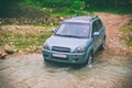 Car moves through mountain river Royalty Free Stock Photo