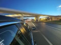 The car is moving at high speed on the night road in the city. Royalty Free Stock Photo