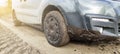 Car in the mud. dirt wheel offroad road after rain