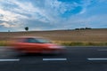 Car on newly paved road