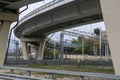 Car overpass over the railroad tracks in the city.