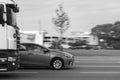 The car overtakes the truck at high speed on the street in heavy traffic. Motion blur. Riga, Latvia - 09 Sep 2021 Royalty Free Stock Photo