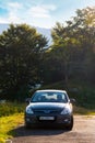 Car parcked near the forest Royalty Free Stock Photo