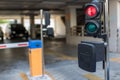 Car park automatic entry system.Security system for building access - barrier gate stop with toll booth, traffic cones