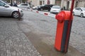 Car park barrier, automatic entry system. Entrance to car park with gated barrier and entry machine