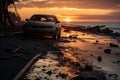 a car is parked on the beach at sunset Royalty Free Stock Photo
