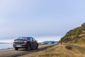 Car parked on a dirt road Royalty Free Stock Photo