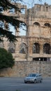 Car parked in front of Amphitheater Pula, Croatia