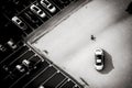 Car is parked in large parking lot, aerial view car parking