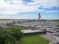 Car Parking and Airport Control Tower, Milan Malpensa Airport -Italy Royalty Free Stock Photo