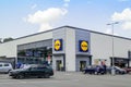 Car parking area around the new LIDL supermarket in Varna. Lidl logos above entrances and large winwow as a half of facade. Royalty Free Stock Photo