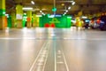 Car parking blurred. Empty road asphalt background in soft focus. Car lot parking space in underground city garage Royalty Free Stock Photo