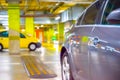 Car parking blurred. Empty road asphalt background in soft focus. Car lot parking space in underground city garage. Urban, Rough Royalty Free Stock Photo