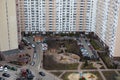 Car parking lot near old house buildings, Aerial view. Living sector